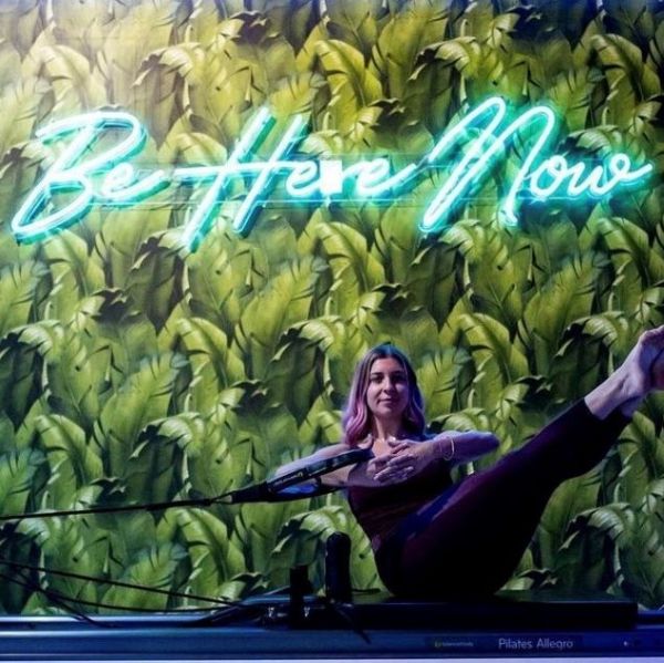 Be Here Now mint green light sign @sensory.fitness pilates studio made by CUSTOM NEON®