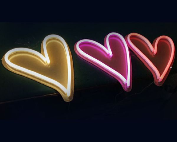 Cute love heart neon lights on colored acrylic backboard in different colors - photos CustomNeon.com