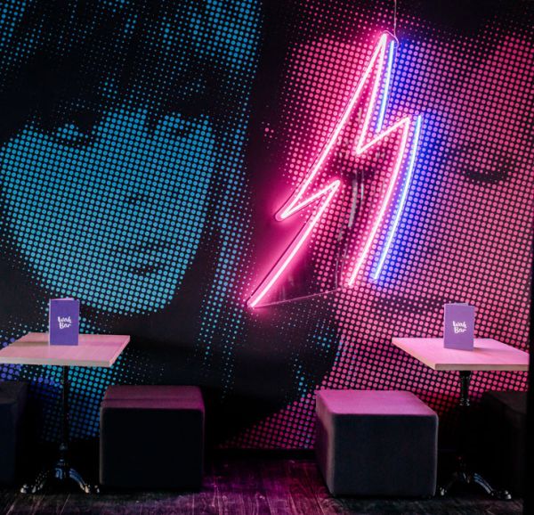 Ultra cool neon wall art chanelling Bowie's iconic look. Awesome neon sign for any music fan.
