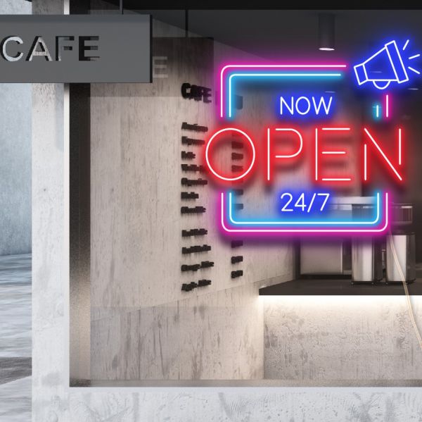NOW OPEN 24/7 LED Neon Multi-Color Open Sign in Square Frame shown closeup in a cafe window - from CustomNeon.com