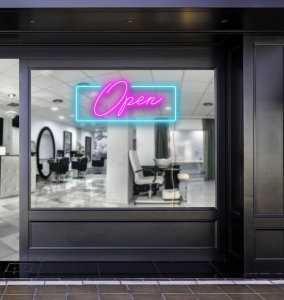 Pink LED neon open sign with a bright blue rectangular outline shown in a beauty salon window - photo CustomNeon.com