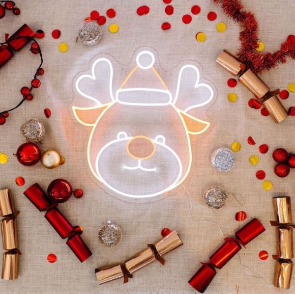 Reindeer neon light in bright white and warm yellow/gold LED neon flex - designed by Custom Neon™