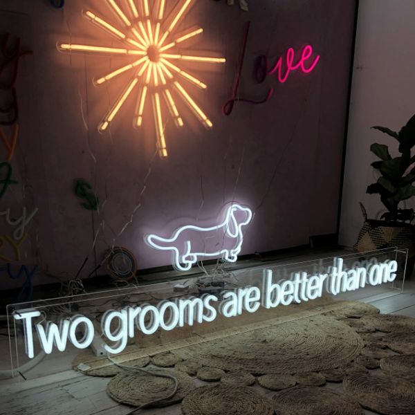 Two Grooms are Better than One LGBTQ+ Friendly Wedding Sign in LED neon flex, shown among other signs from Custom Neon