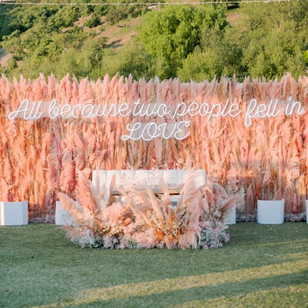 All Because Two People Fell in LOVE Neon Sign - photo from CustomNeon.com