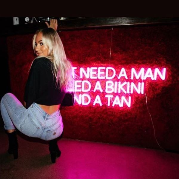 I Don't Need a Man I Need a Bikini and a Tan LED neon flex sign shown illuminated  - from Custom Neon