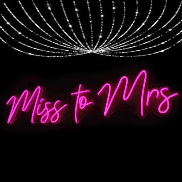 Miss to Mrs LED Neon sign in a cursive font - photo from CustomNeon.com