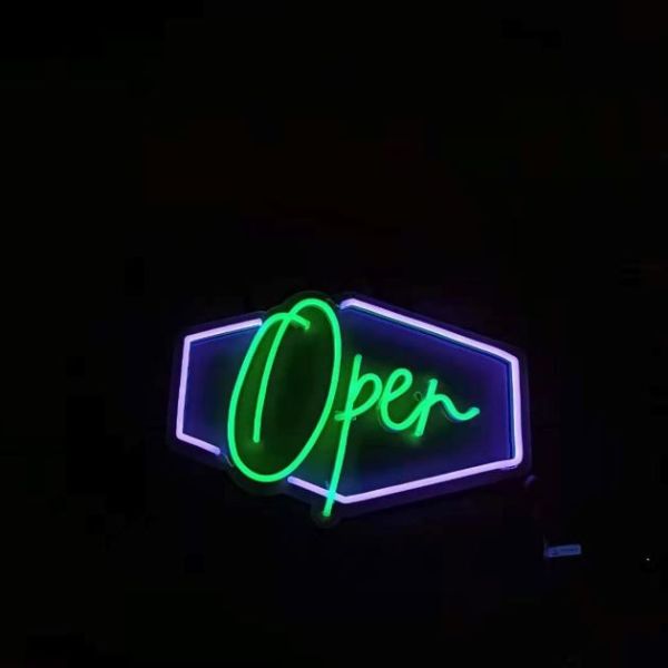 LED neon sign in green and purple - made by Custom Neon®