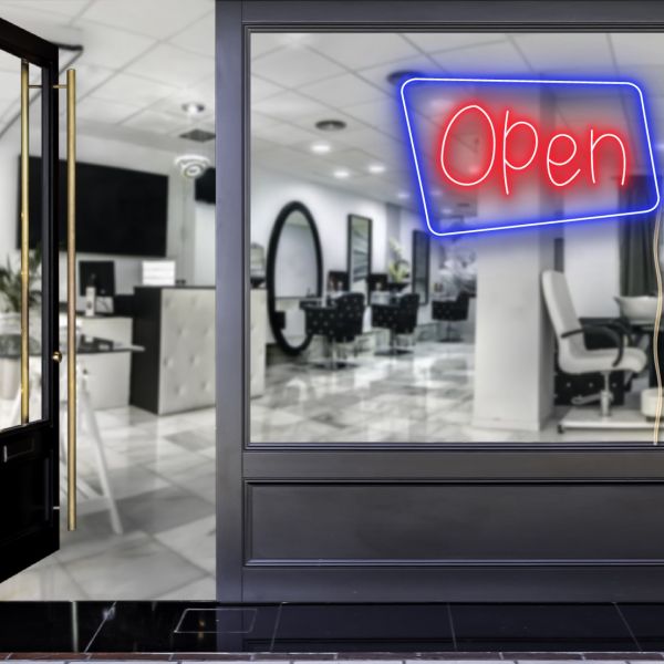 Neon look LED shop open sign in blue and red with an asymmetric outline shown in a hair salon window - from CustomNeon.com