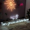 Two Grooms are Better than One LGBTQ+ Friendly Wedding Sign in LED neon flex, shown among other signs from Custom Neon