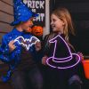 Custom Neon® Halloween lightup decoration signs: purple witch's hat & a white bat