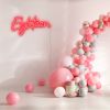Eighteen Light Sign shown in red with a balloon arch and presents |  Custom Neon®
