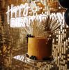 Custom Neon® Happy Birthday sign in white LED neon flex on a golden shimmer wall behind a birthday cake @raspberrycraftsandevents.
