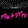 Miss to Mrs LED Neon sign in a cursive font - photo from CustomNeon.com