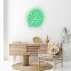 Green LED neon monstera leaf on a white wall - CUSTOM NEON®
