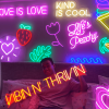 Flower Neon Wall Art from Custom Neon® shown as bedroom decor