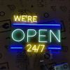 We're Open 24/7 LED neon sign in blue, white and yellow - made by Custom Neon