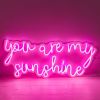 You Are my Sunshine cotton candy pink LED neon sign on a white acrylic backboard - by CUSTOM NEON® 