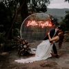 Better Together wedding lightup sign behind the happy couple @customneon