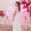 Crazy In Love Wedding Sign in brilliant LED neon flex shown in pink with the beautiful bride, wedding florals and cakes - photo from CustomNeon.com