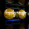 Custom Neon's Happily Ever After warm white light sign on wine barrels @SandlefordWinery photo by @louisefowlertuttphotography