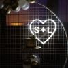 Personalized Heart Neon Sign in LED Flex with clear acrylic background displayed with balloons and wedding cake - photo from CustomNeon.com