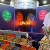Let's Chat light-up sign shown at a tradeshow - photo from CustomNeon.com
