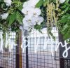 * Mr & Mrs * LED Neon Wedding Sign shown as part of the wedding decor. - Photo CustomNeon.com
