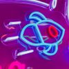 Custom Neon® rocketship artwork in blue red and white