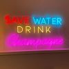 Save Water and Drink Champagne neon bar sign from Custom Neon 
