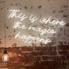 This is Where the Magic Happens white neon flex sign on distressed brick wall @customneon