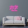 When Life Gives You Lemons pink neon flex sign wall mounted above a sofa - design by Custom Neon