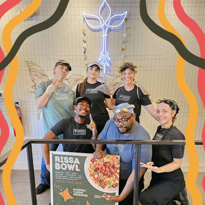 White Custom Neon® logo sign for Columbus hospitality venues @rootsnk