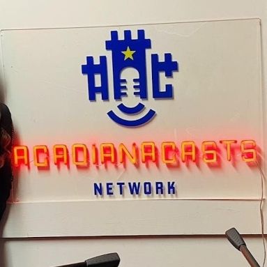 Custom Neon® AcadianaCasts Network sign with a castle and microphone logo in a podcast studio