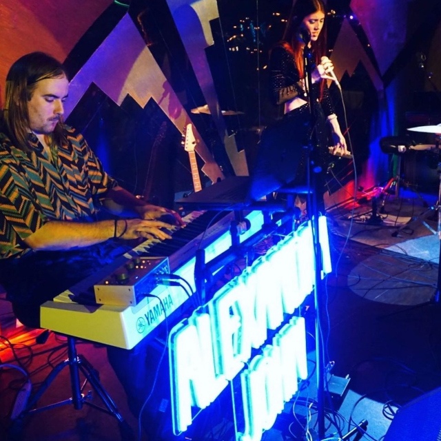 Deep blue Alexandra John Custom Neon® stage sign @alexandrajohnmusic