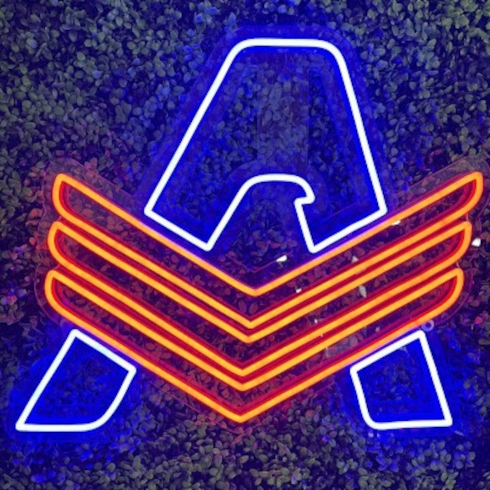 Custom Neon® A logo on grass wall @usawraps