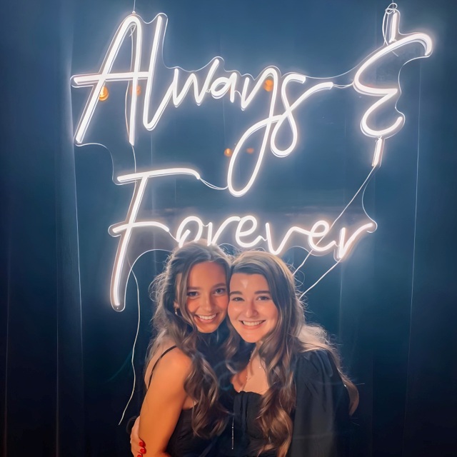 Blue @kaninesocial branded Custom Neon® selfie wall backdrop sign