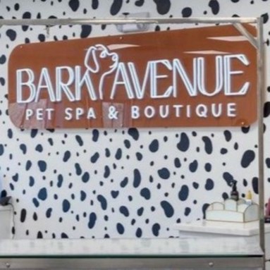 Custom Neon® dog grooming LED neon UV print sign on dog paw print wallpaper  @barkavenuelafayette