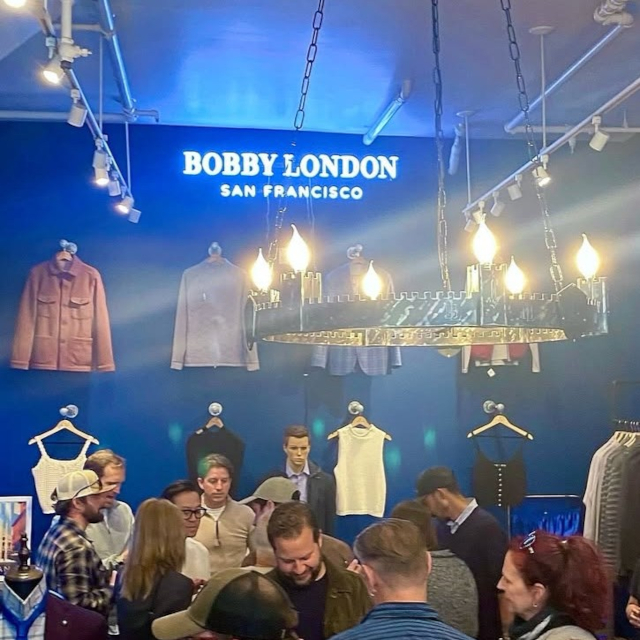 Bobby London San Francisco white Custom Neon® store name sign on a grey blue wall @bobbylondon