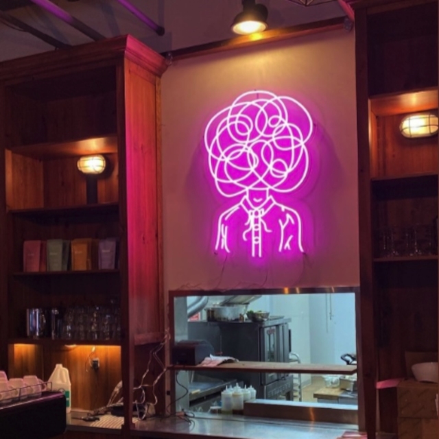 Pink cafe logo sign by Custom Neon® @armelle.cafe