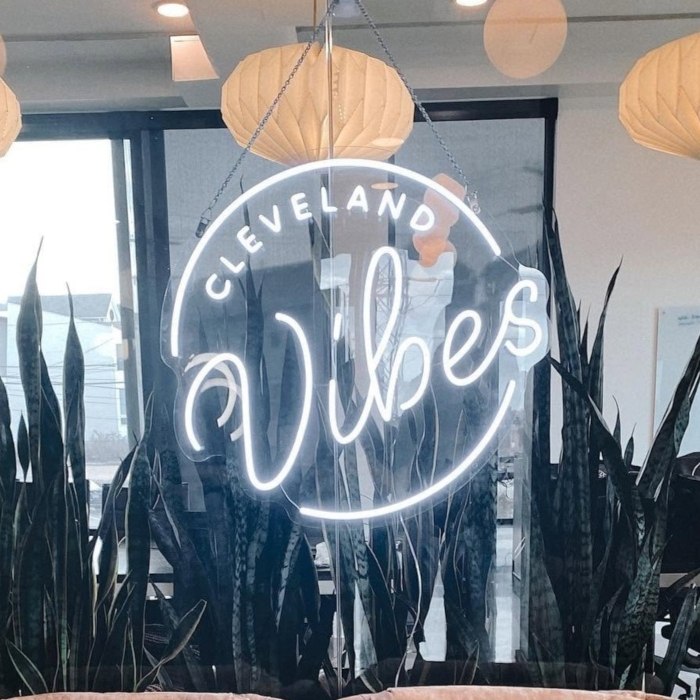 White Custom Neon® logo sign for office @clevelandvibes