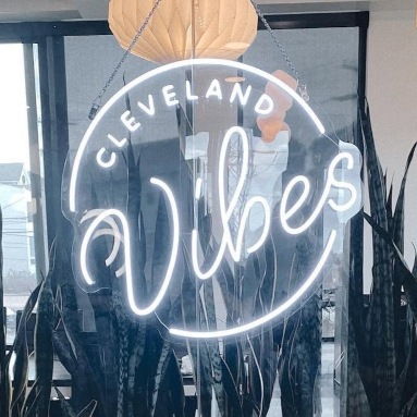 White Custom Neon® logo sign for office @clevelandvibes