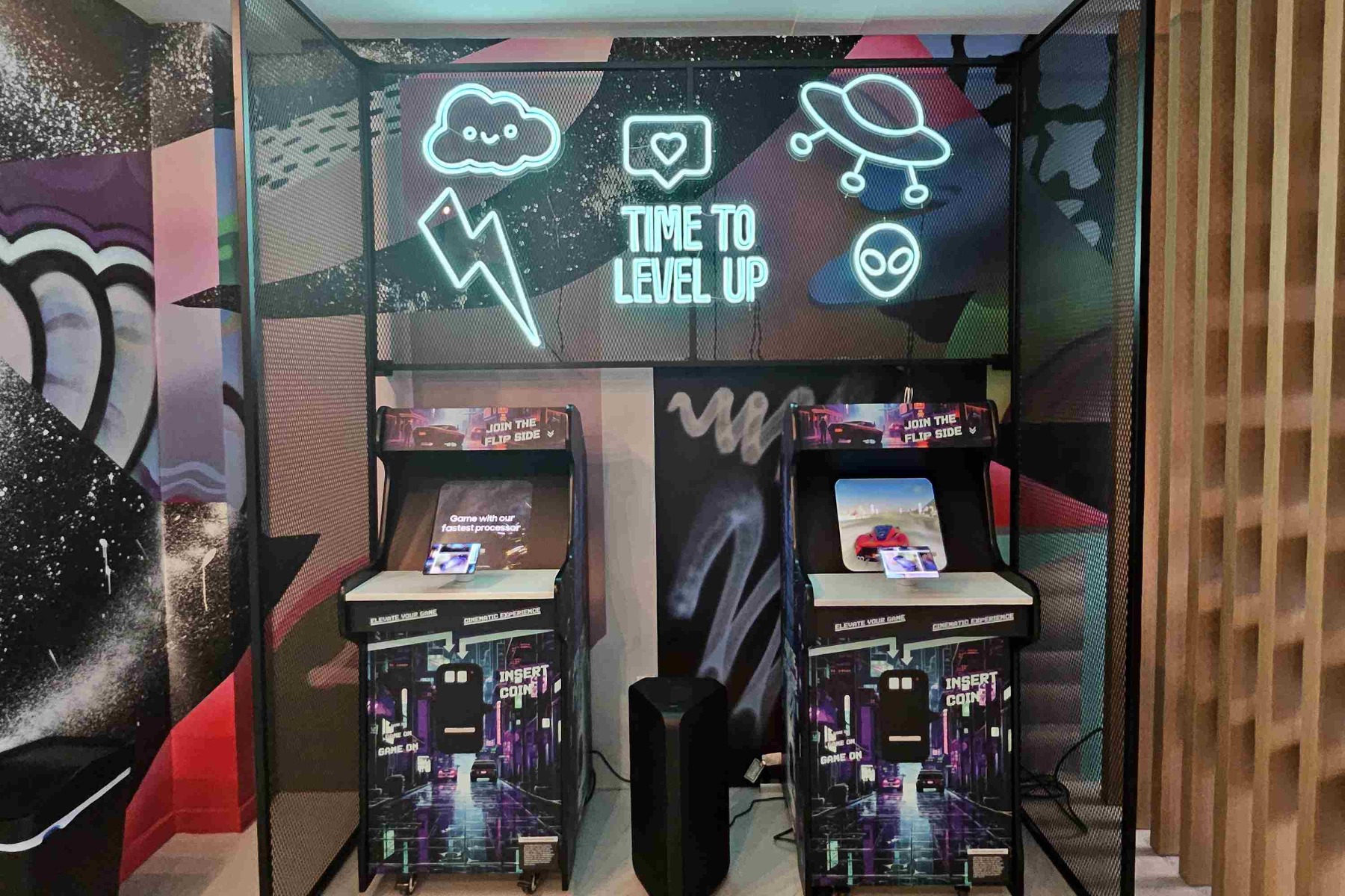 Retro Custom Neon&reg; gaming signs above the video games in the   Samsung Flip Side Pop-Ups