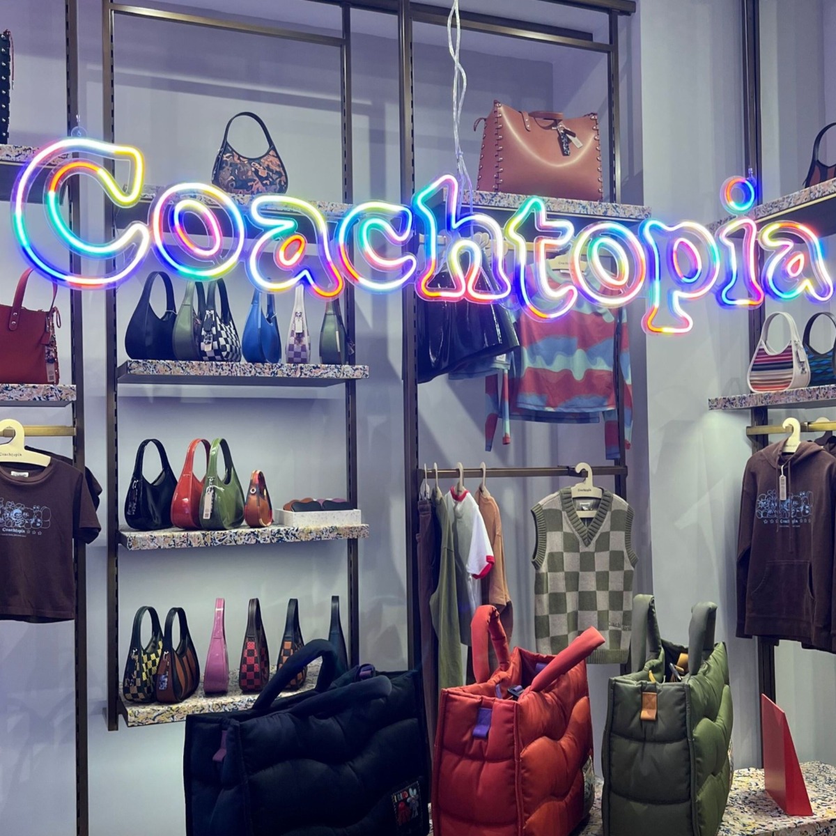 Custom Neon® upcycled no-waste logo signs for Coachtopia @Coach