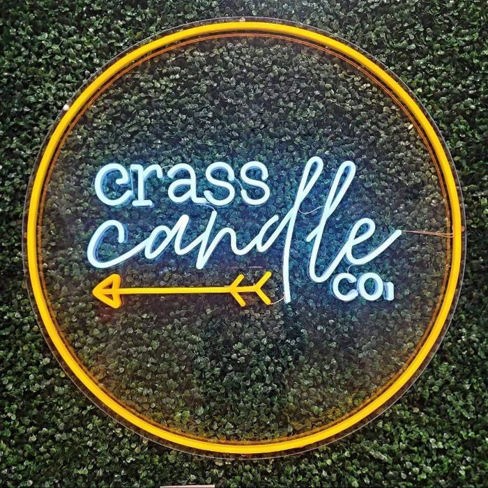Custom Neon® outdoor white & yellow logo sign @crasscandleco