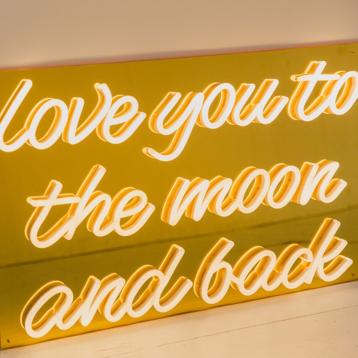 Custom Neon® sign on gold acrylic backing