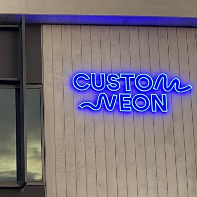 Custom Neon® logo outside the Custom Neon® office building
