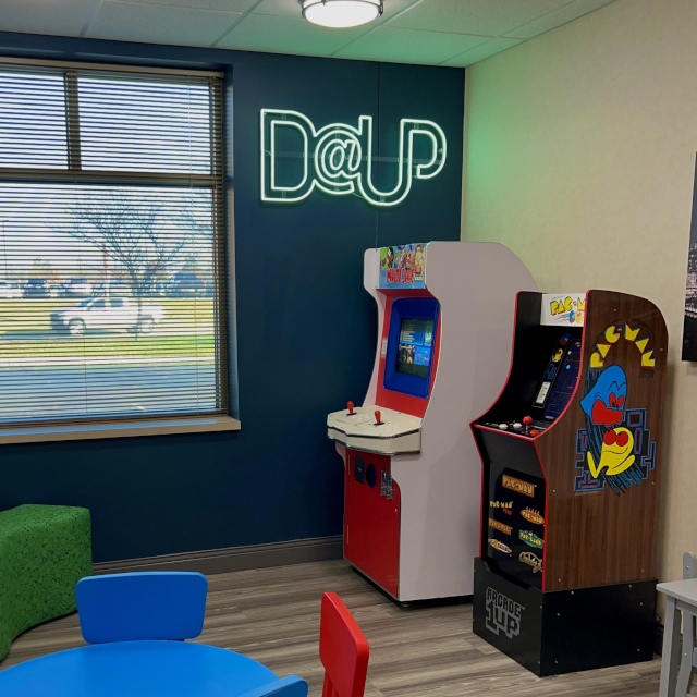 Green Custom Neon® sign for Columbus Dentists @dentistryatup