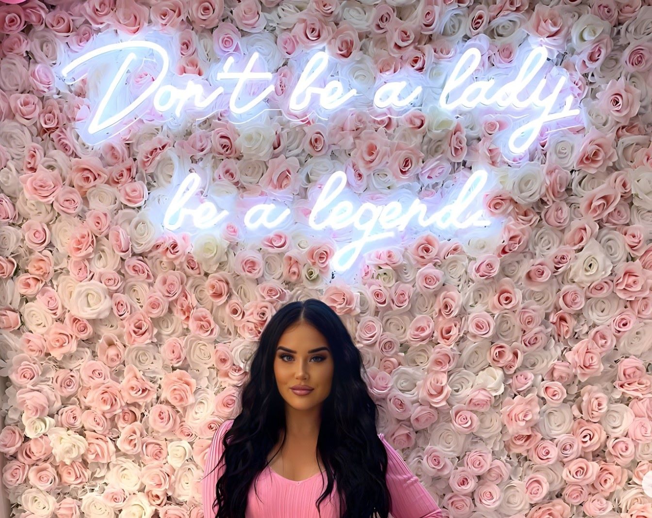 White Custom Neon® sign on pink floral wall @jglowbeautyllc