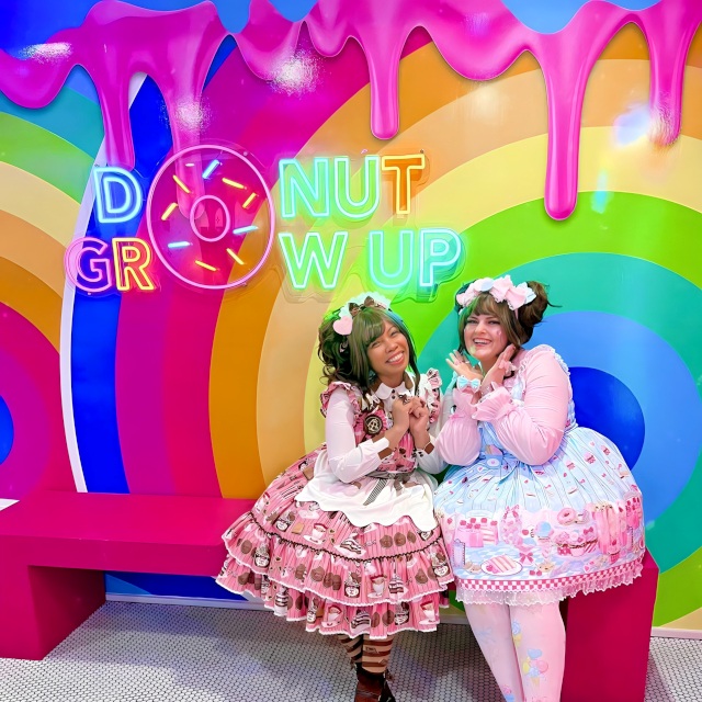 Donut Grow Up selfie booth sign made by Custom Neon® on a rainbow photo wall in a Sundae Donut shop photo @snazzytazzes