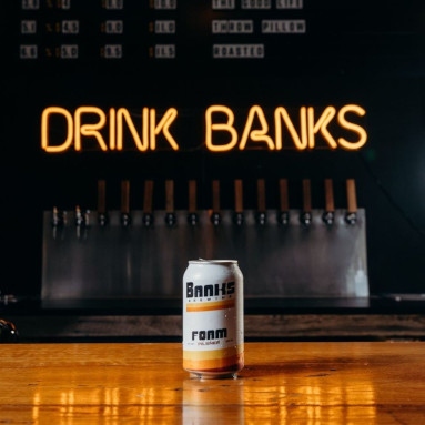 Orange Custom Neon® beverage brand sign @banksbrewing